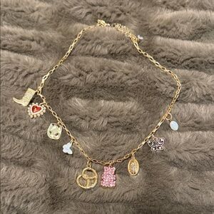 Gold Charm Necklace with Pink and White Accents